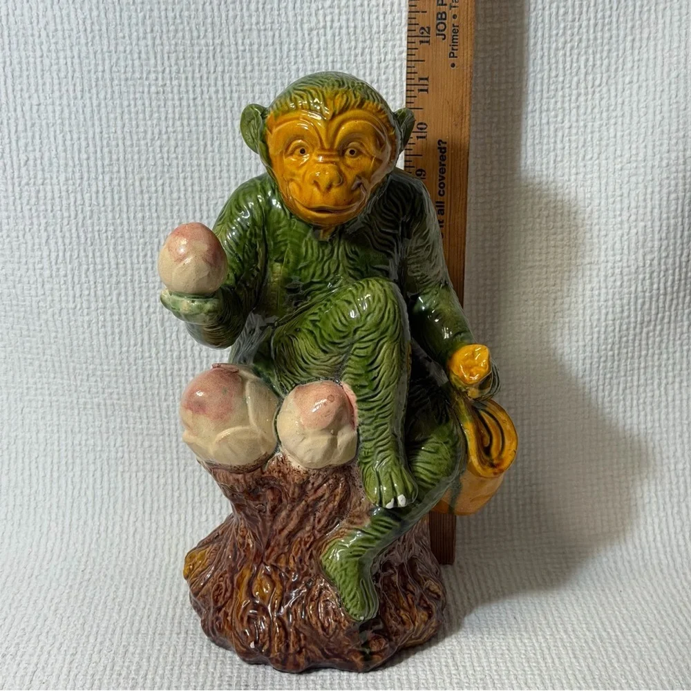 Antique Collectible Monkey Holds Fruits and Water bag.